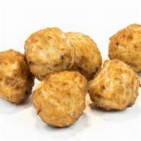 Squid Balls · A savory treat perfect as a snack, these balls of squid meat are fried until golden brown an...