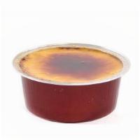 Creme Brulee · A rich custard based finished with a torched caramelized sugar top.