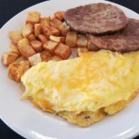Ham & Cheese Omelet · Filled with diced ham and shredded Colby Jack cheese and your choice of sides.