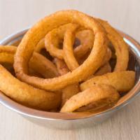 Sudo Onion Rings · Battered and deep fried.
