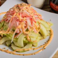 Kani Salad · Kani cucumber and smelt roe with spicy mayo.