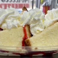 Strawberry Pound Cake Sundae · Three delicious scoops of vanilla ice cream, covered with strawberry sauce, whipped cream, a...