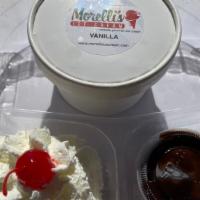 Hot Fudge Sundae · Our amazing vanilla ice cream, fudge, whip cream, and a cherry.