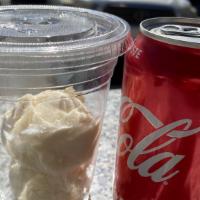 Coke Float · Our creamy vanilla ice cream (no substitutions on ice cream) and a classic coke.