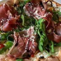 Tricolore Pizza · Mozzarella cheese, Arugula, prosciutto di parma, olive oil, Balsamic vinagrete and parmesan ...