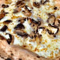 Tartufata Pizza · White pizza, filled with mozzarella cheese, fresh backed mushrooms, slices of fresh truffle,...