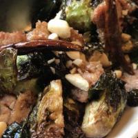 Kung Pao Brussel Sprouts · 350 cal. chicken sausage, sweet soy, chile de arbol, toasted peanuts