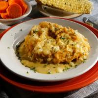 Country Fried Chicken With Sawmill Gravy · Includes 2 sides and choice of bread. This taste treat is a southern classic. We start with ...