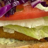 Fish Sandwich · Homemade sandwich with baked fish, tomato, salad, cabbage and homemade mayonnaise.