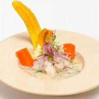 Ceviche De Pescado · Chunks of fish perfectly marinated, served with sweet potatoes slices and Peruvian corn.