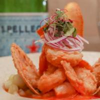 Ceviche Inka · Chunks of corvina fish, scallops, and fried shrimp marinated in our signature sauce.