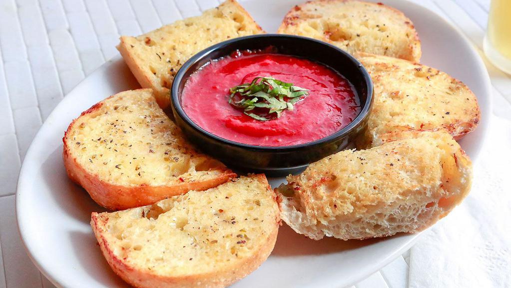 Garlic Bread · Ciabatta Bread and Garlic Butter.

Baked golden brown and served with a side of our house-made Pizza Sauce!