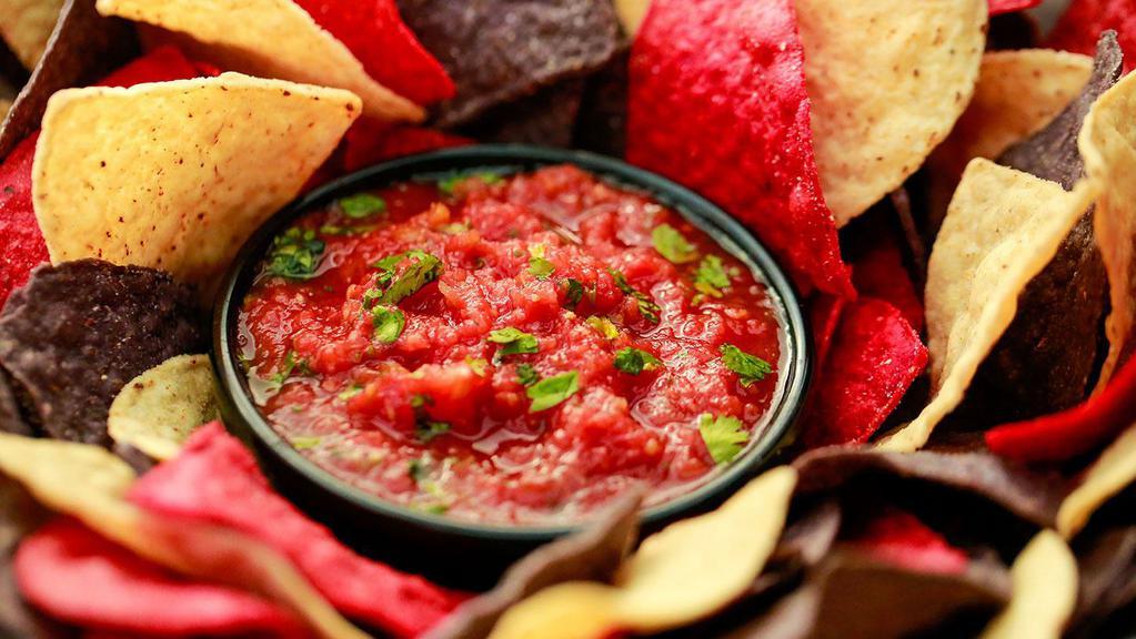 Chips & House Made Salsa · Tortilla Chips served with our house-made Salsa.

**Gluten-Free Menu Item**