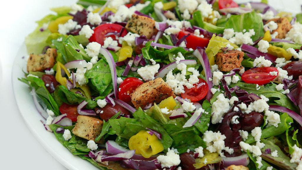 Greek Salad · Mixed Greens, Red Cabbage, Kalamata Olives, Cheery Tomatoes, Red Onions, Pepperoncinis, Feta Cheese, and house-made Croutons.

Served with a side of our Creamy Gorgonzola or House Vinaigrette.