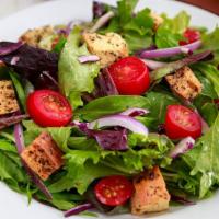Simple Salad · Mixed Greens, Red Cabbage, Red Onions, Cherry Tomatoes, and house-made croutons.

Served wit...