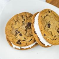 Double Doozie Cookie · 2 regular size cookies in a sandwich with vanilla icing in between. Flavors - original choco...