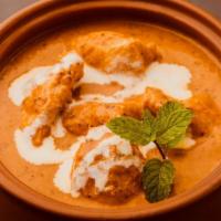 Butter Chicken · Tender chicken cooked with mild and beautifully fragrant spices accentuated with a nutty cas...