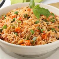 Shezwan Fried Rice (Veg) · Indo-Chinese style Rice tossed with Shezwan sauce, veggies, peppers & chillis