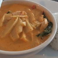 Red Curry · Spicy. Red curry, coconut milk, bell pepper, bamboo shoots and basil leaves.