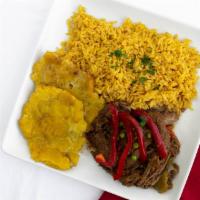 Ropa Vieja · An old Cuban favorite, shredded beef stewed slowly in a Spanish sauce with fresh peppers, to...