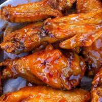 Hiccups Wings (10 Pieces) · Our famous chicken wings with variety of flavor options: Mango Habanero, Buffalo, Cajun, and...