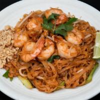 Pad Thai · Stir-fried rice noodles with egg, tofu, bean sprouts, crushed peanuts, lime, and with your c...