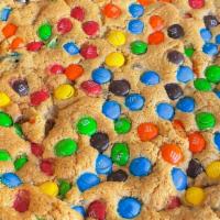 Jumbo M&M Cookie · Our amazing Chocolate Chip Cookie topped with M&M.  Feeds 10-12.  
TIP: 
Pop it in the oven ...
