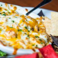 David'S Chicken & Friends · Grilled chicken in our medium sauce, bacon, shredded cheese, scallions and ranch dressing al...