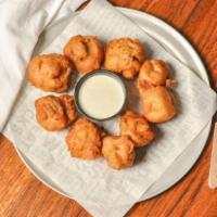 Fried Shrooms · Dipped in our own spicy beer batter and served with ranch for dipping.