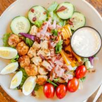 The Wild Chef Salad · A traditional chef salad gone wild! Grilled chicken, julienned ham and spicy shrimp topped w...