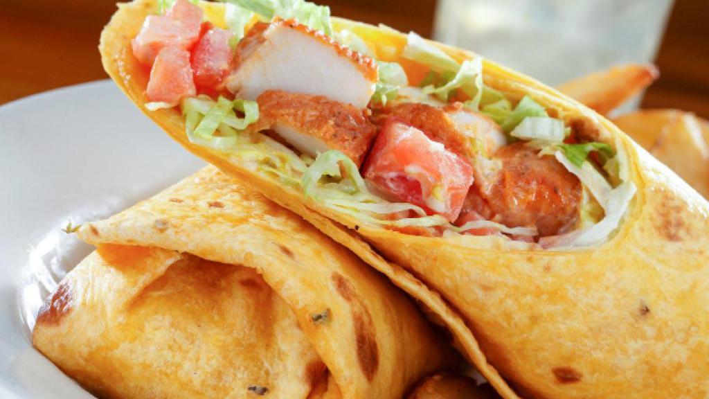 Buffarella Wrap · Spicy fried chicken strips dipped in hot sauce, crisp lettuce, diced tomatoes, mozzarella and cheddar cheese with creamy ranch dressing, in a jalapeño cheddar tortilla.