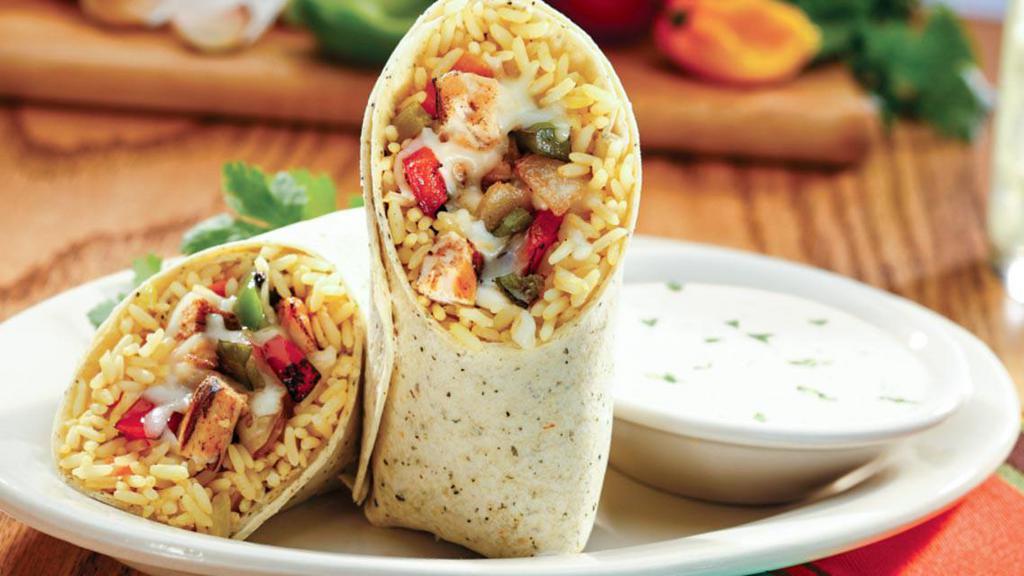 Fajita Fiesta Wrap · Grilled fajita chicken, caramelized onions, roasted peppers, fiesta rice and monterey jack cheese wrapped in a garlic herb tortilla. Served with southwest ranch for dipping.