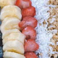 Açaí Bowl · Topped with banana, strawberries, blueberries, coconut flakes, & oats