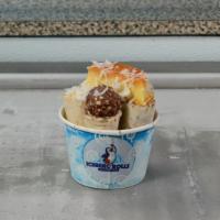 @@ El Mijo Flan @@ · Vanilla base, half of a flan mixed with 2 Ferrero Rocher bonbons and on top the other half o...