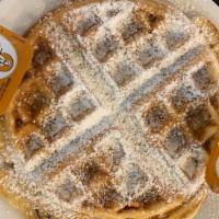 Belgian Waffles · Served with powder sugar and syrup.