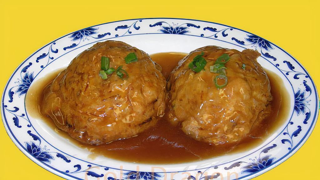 Chicken Egg Foo Young · With white rice.