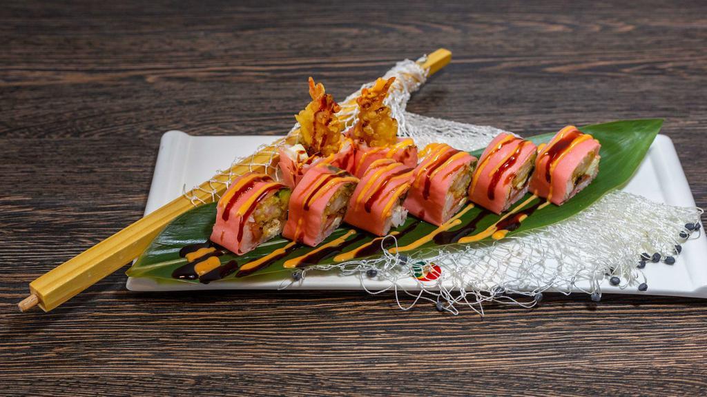 Crazy Roll · Eel, tempura shrimp, crab meat, cream cheese, avocado and smoked salmon wrapped in soy paper topped with spicy mayo and eel sauce.