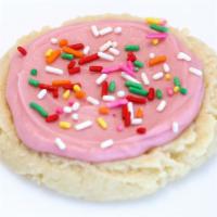 Sprinkles Sugar Cookie · Cotton candy icing and sprinkles.