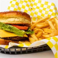 Spicy Turkey Burger · With American cheese fully dressed with lettuce and tomato. Served with fries.