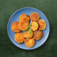 Veggie Cutlet · Mashed potatoes, peas, and spices dipped in a spicy batter and coated with bread crumbs, and...