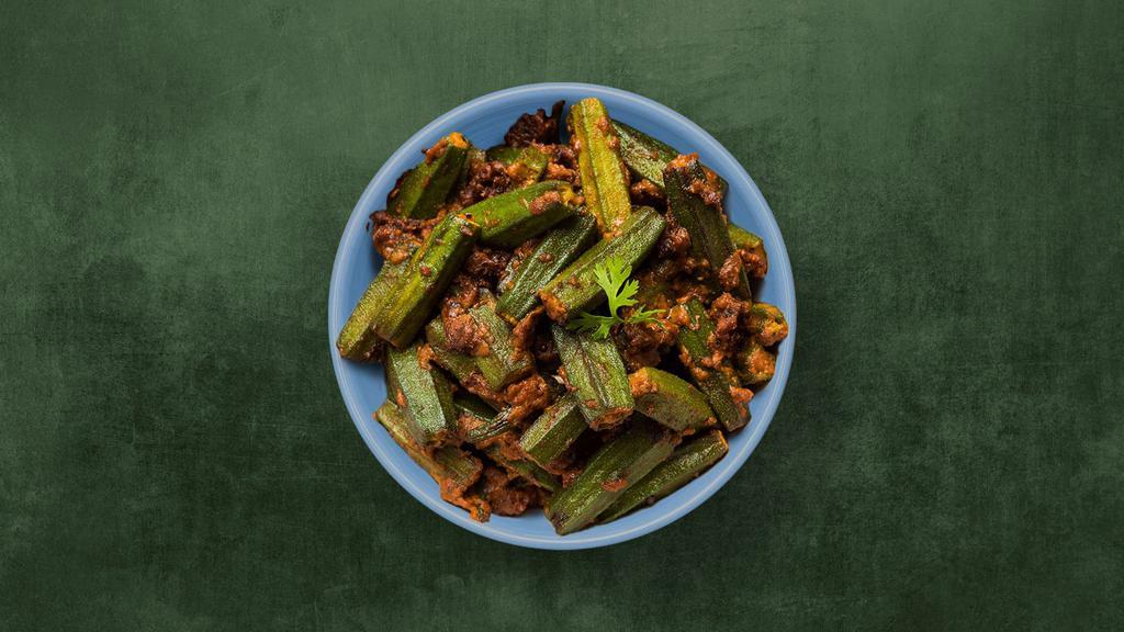 Okra Classic · Diced fresh okra, sautéed with onions, garlic, and spices till crisp. Served with a side of plain rice.