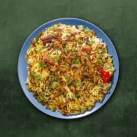 Mushroom Biryani · Aromatic basmati rice cooked with mushroom and fresh herbs, spices and cooked in a special h...