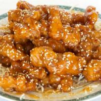 Sesame Chicken · Hot and spicy. served with pork fried rice and egg roll.