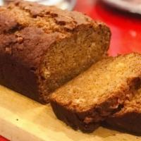 Banana Bread · Slice of moist banana bread made with real bananas.  No nuts