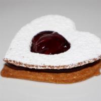 Raspberry Linzers · Classic Linzers with Raspberry Filling: Heart Shaped and dusted with powder sugar