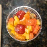 Ethiopian Fruit Salad · Oranges, bananas, pineapple, mango, kiwi, grapes, berries.