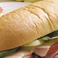 Classic Turkey Sandwich · Turkey topped with cheese, lettuce, tomato, 
Mayonnaise, and Hickory Honey Mustard