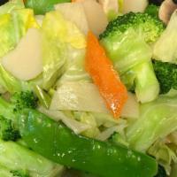 Sautéed Mixed Vegetables · Served with white rice.