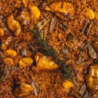Traditional Valencian Paella · Chicken, artichokes, garrofo, beans, tomatoes, rice (senia type), rosemary, saffron