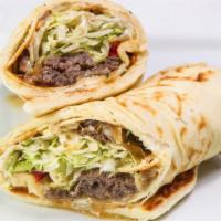 Philly Cheesesteak Wrap · Grilled steak, bell pepper blend, caramelized onions, Provolone, shredded lettuce, herb mayo.